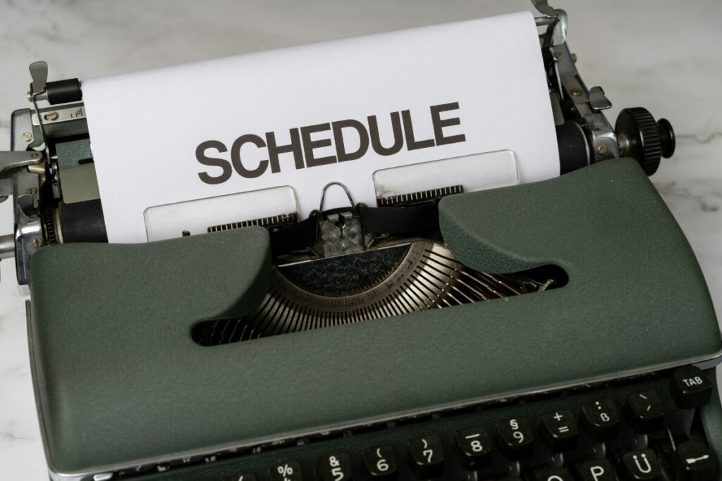 typewriter with the text "schedule"